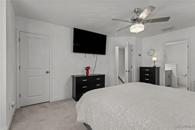 7217 Leire Ln, Chesterfield, VA 23832 - bedroom with light colored carpet, baseboards, ensuite bathroom, and a ceiling fan