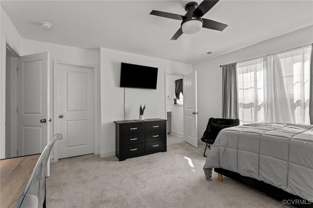 7217 Leire Ln, Chesterfield, VA 23832 - bedroom with light colored carpet, ceiling fan, and baseboards