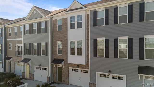 7217 Leire Ln, Chesterfield, VA 23832 - view of property with brick siding and an attached garage