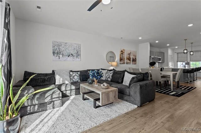 7217 Leire Ln, Chesterfield, VA 23832 - living room with a ceiling fan, wood finished floors, and recessed lighting
