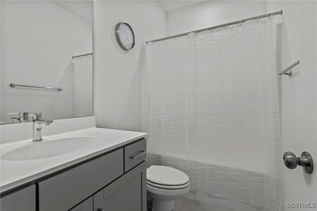 7217 Leire Ln, Chesterfield, VA 23832 - bathroom with toilet, vanity, and shower / tub combo with curtain