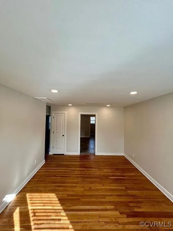 3002 5th Ave, Richmond, VA 23222 - unfurnished room with wood finished floors, baseboards, and recessed lighting