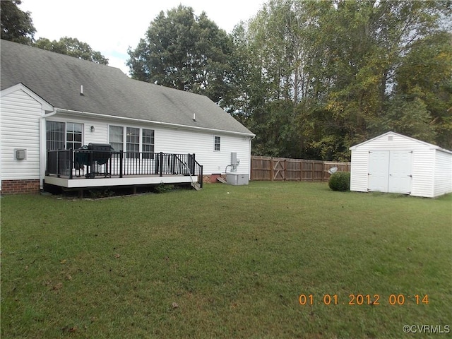 8304 Elizabeth Ann Dr, Hanover, VA 23111 - back of property featuring a deck and roof with shingles