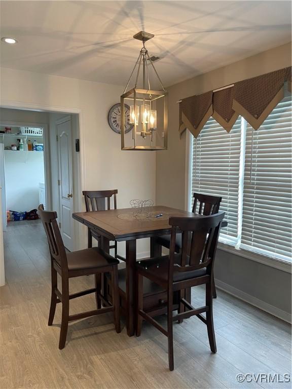 8304 Elizabeth Ann Dr, Hanover, VA 23111 - dining room with light wood-style flooring, a chandelier, baseboards, and recessed lighting