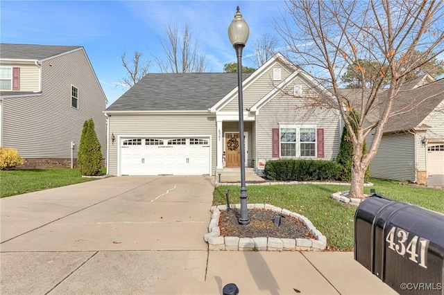 4341 Kenmare Ct, Richmond, VA 23234 - traditional-style house featuring an attached garage, driveway, and a front lawn