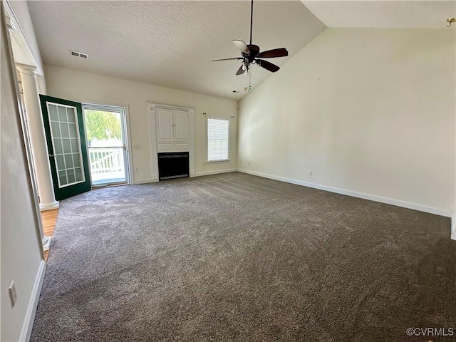 240 Lighthouse Pointe, North Prince George, VA 23860 - unfurnished living room featuring ceiling fan, light carpet, plenty of natural light, baseboards, and lofted ceiling