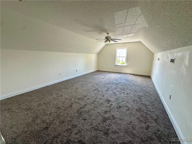 240 Lighthouse Pointe, North Prince George, VA 23860 - additional living space featuring a textured ceiling, carpet flooring, ceiling fan, lofted ceiling, and baseboards