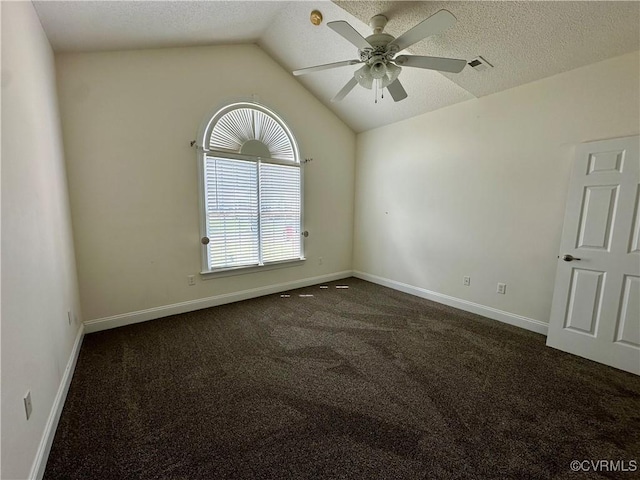 240 Lighthouse Pointe, North Prince George, VA 23860 - unfurnished room featuring ceiling fan, lofted ceiling, dark colored carpet, baseboards, and a textured ceiling