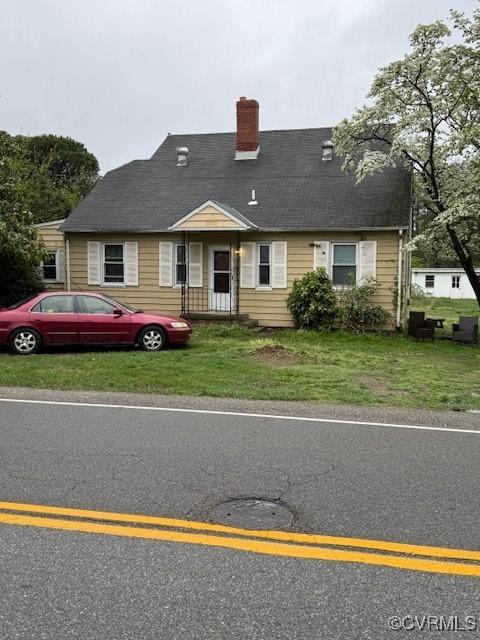 2005 Hungary Rd, Henrico, VA 23228 - view of front facade featuring a chimney and a front lawn