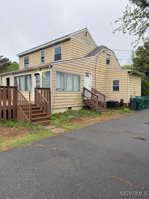 2005 Hungary Rd, Henrico, VA 23228 - view of front facade with entry steps, cooling unit, and crawl space