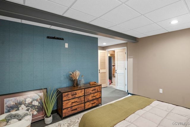 carpeted bedroom with recessed lighting