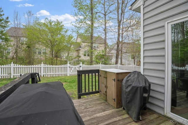 wooden deck featuring fence and grilling area