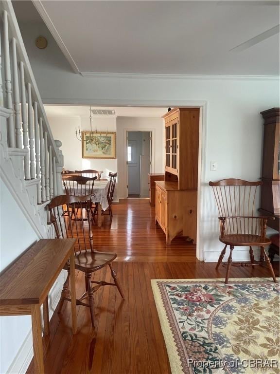 211 Taylor Ave, Urbanna, VA 23175 - interior space featuring wood finished floors, visible vents, and stairway