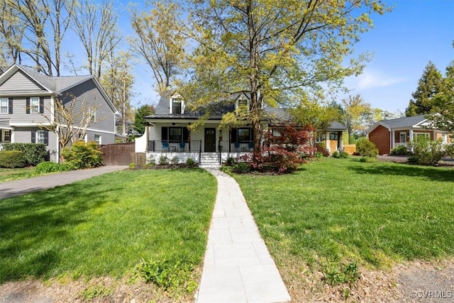 view of front of home featuring a front lawn and covered porch
