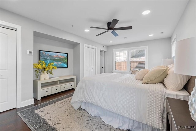 bedroom with baseboards, a ceiling fan, wood finished floors, and recessed lighting