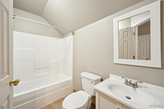 bathroom with shower / bathtub combination, toilet, lofted ceiling, and vanity