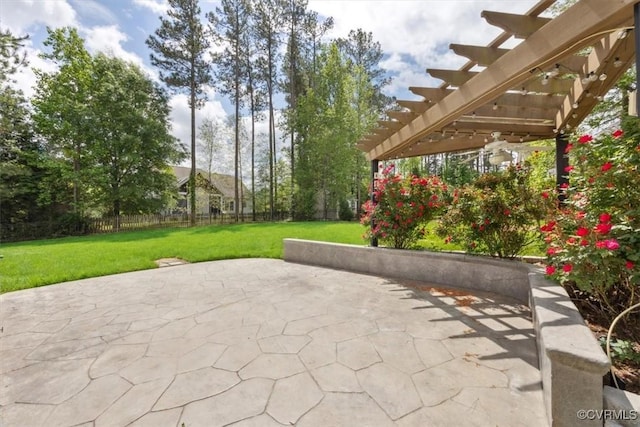 view of patio / terrace featuring fence and a pergola