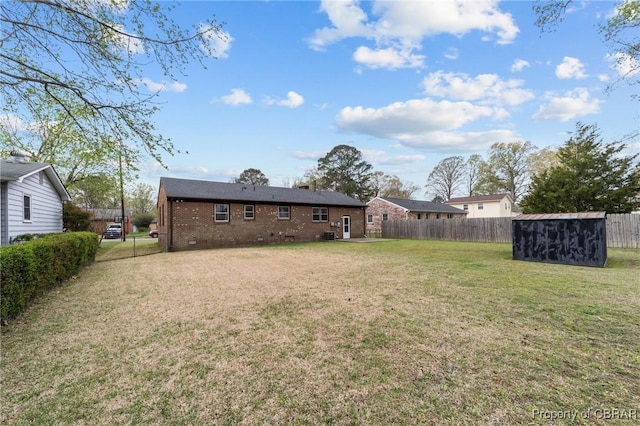 view of yard featuring a fenced backyard