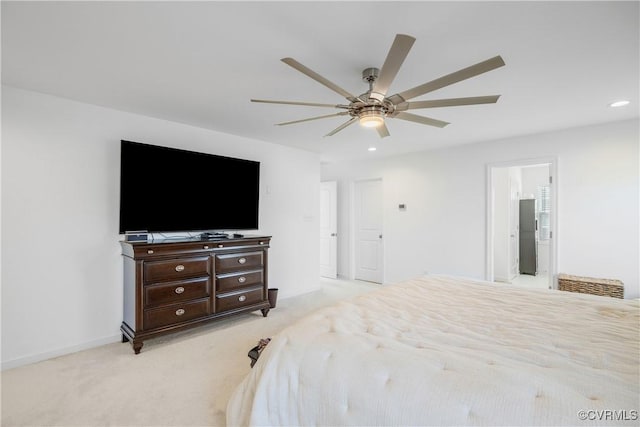 bedroom with baseboards, ceiling fan, recessed lighting, connected bathroom, and light colored carpet