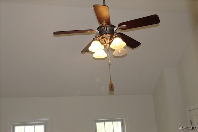 interior details featuring a ceiling fan