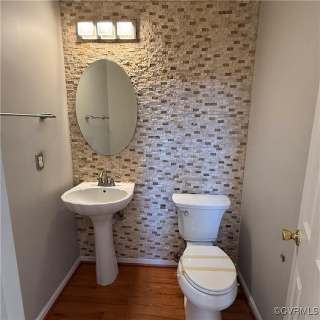1353 Woodside Mews, Henrico, VA 23231 - bathroom with toilet, wood finished floors, and baseboards
