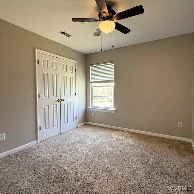 1353 Woodside Mews, Henrico, VA 23231 - unfurnished bedroom with visible vents, baseboards, carpet flooring, and a closet