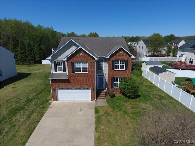1353 Woodside Mews, Henrico, VA 23231 - view of front of property with a garage, fence, brick siding, a front lawn, and driveway