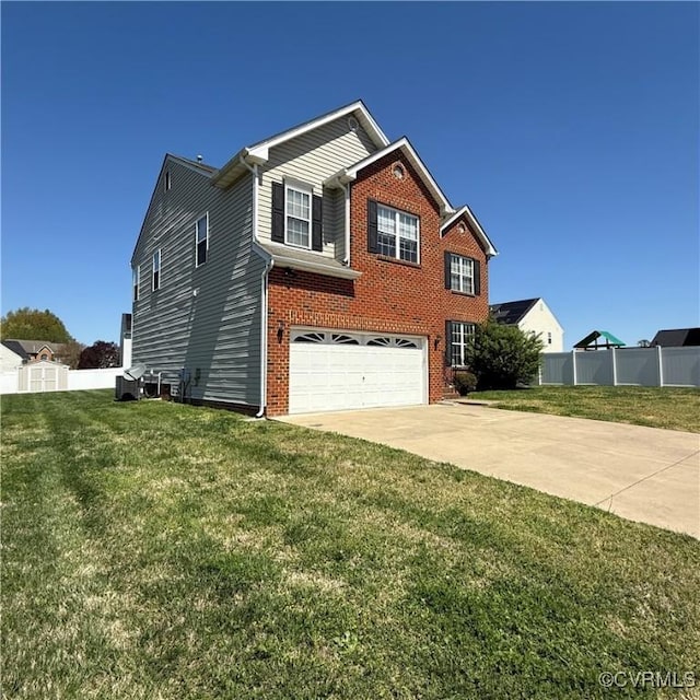 1353 Woodside Mews, Henrico, VA 23231 - view of front of house with an attached garage, fence, brick siding, a front lawn, and driveway