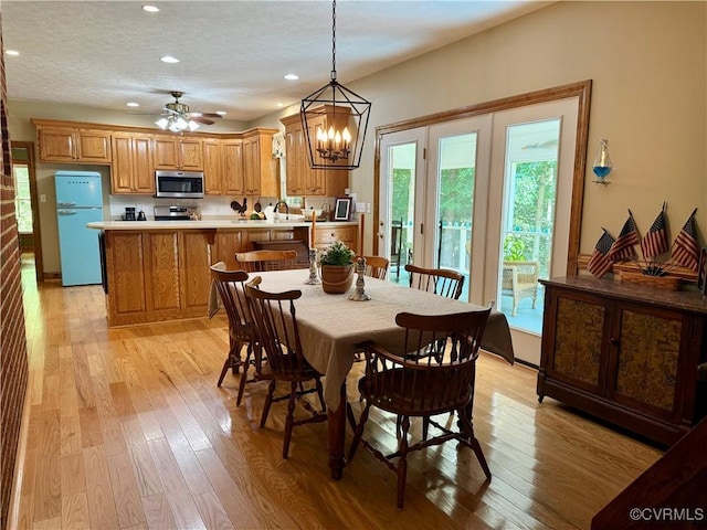 2222 Green Level Rd, King William, VA 23086 - dining room featuring recessed lighting, light wood finished floors, a chandelier, a ceiling fan, and a textured ceiling