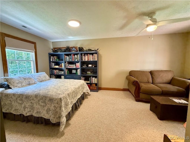 2222 Green Level Rd, King William, VA 23086 - bedroom featuring light carpet, a textured ceiling, and ceiling fan