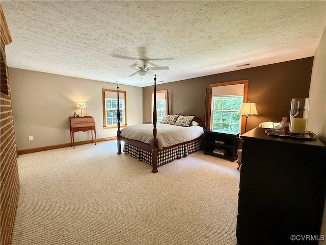 2222 Green Level Rd, King William, VA 23086 - bedroom with light colored carpet, a textured ceiling, and ceiling fan