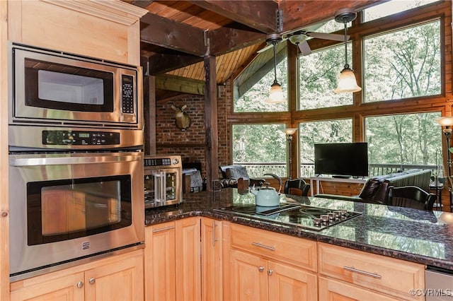 1115 Old Church Rd, Hanover, VA 23111 - kitchen with light brown cabinetry, stainless steel appliances, wooden ceiling, and dark stone counters