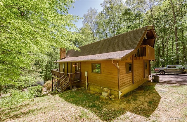 1115 Old Church Rd, Hanover, VA 23111 - view of side of property with a shingled roof, a chimney, and cooling unit