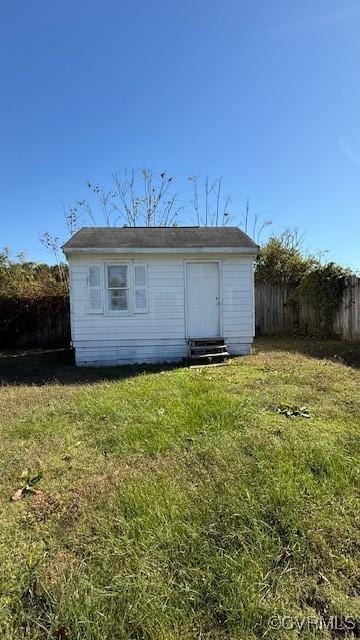 4409 Samara Dr, Henrico, VA 23231 - back of house with a yard, entry steps, an outdoor structure, and fence