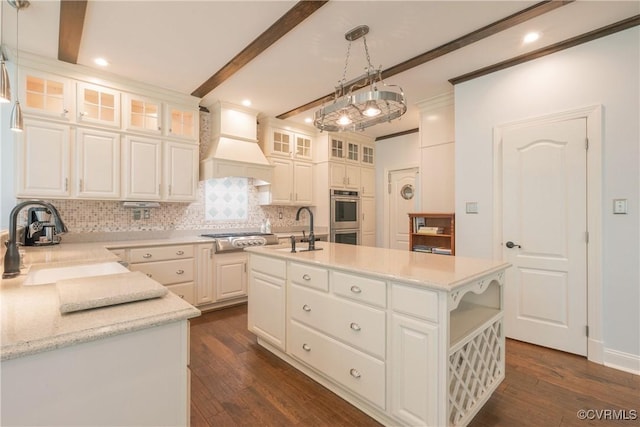 8907 First Branch Ln, Chesterfield, VA 23838 - kitchen featuring a sink, stainless steel appliances, decorative backsplash, custom exhaust hood, and beam ceiling