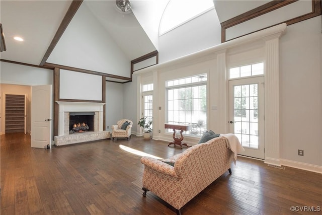 8907 First Branch Ln, Chesterfield, VA 23838 - living area with high vaulted ceiling, dark wood-style floors, a brick fireplace, baseboards, and recessed lighting