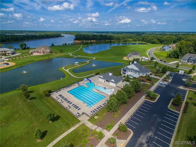 drone / aerial view with a water view