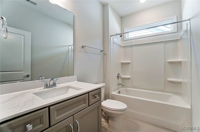 bathroom featuring shower / bath combination, vanity, toilet, and visible vents