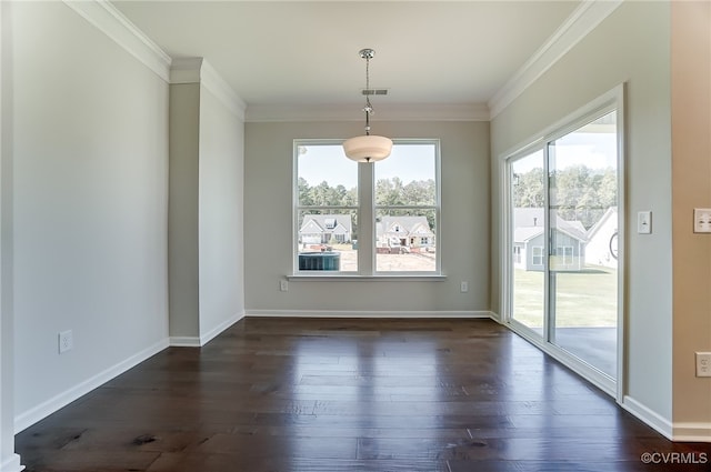 unfurnished dining area with crown molding, plenty of natural light, dark wood-style flooring, and visible vents