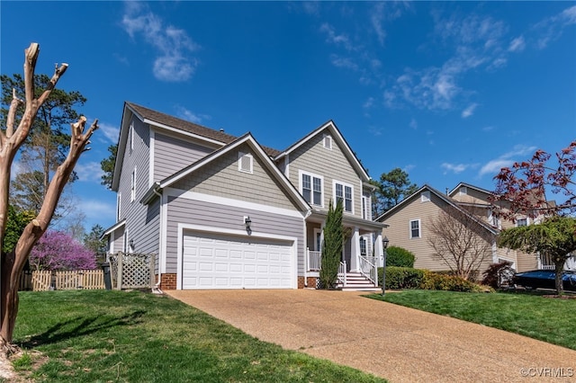 view of front of property featuring concrete driveway and an attached garage