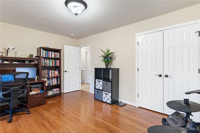 office area featuring light wood finished floors