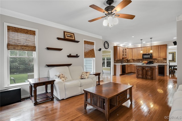2228 Millcrest Ter, Midlothian, VA 23112 - living room featuring ornamental molding, ceiling fan, light wood finished floors, and recessed lighting