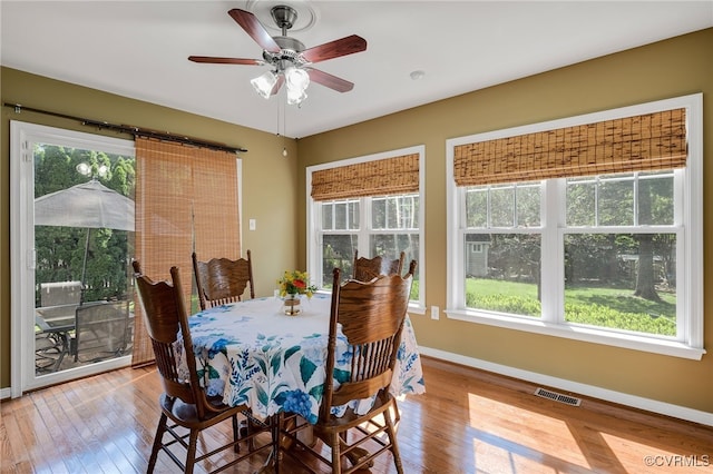 2228 Millcrest Ter, Midlothian, VA 23112 - dining area featuring wood finished floors, healthy amount of natural light, and a ceiling fan