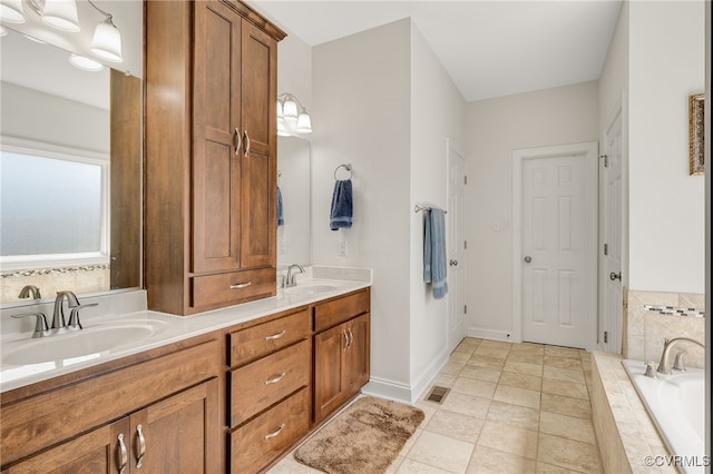 17248 Ivory Bill Ln, Chesterfield, VA 23838 - full bath featuring double vanity, visible vents, a sink, and tiled bath
