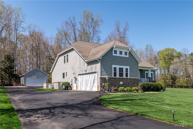 17248 Ivory Bill Ln, Chesterfield, VA 23838 - view of front of house with a shingled roof, a garage, stone siding, and a front lawn