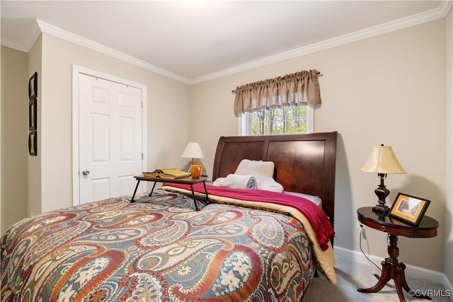 carpeted bedroom with baseboards and crown molding
