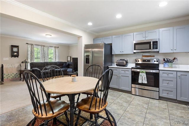 kitchen with light countertops, appliances with stainless steel finishes, and gray cabinets