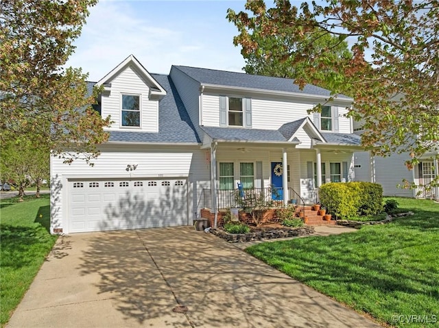 view of front of house featuring roof with shingles, a porch, driveway, and a front lawn