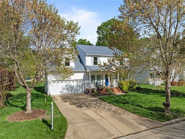 traditional home with a front yard, a shingled roof, and concrete driveway