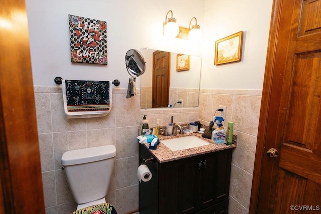 9522 Broad Meadows Rd, Glen Allen, VA 23060 - bathroom with vanity, tile walls, a wainscoted wall, and toilet